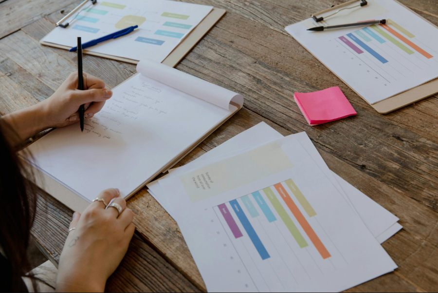 Clinical psychologist writing detailed Autism diagnostic assessment report