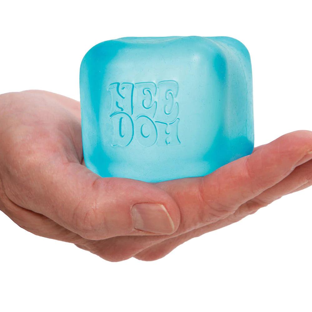 NeeDoh cube stress relief fidget in hand